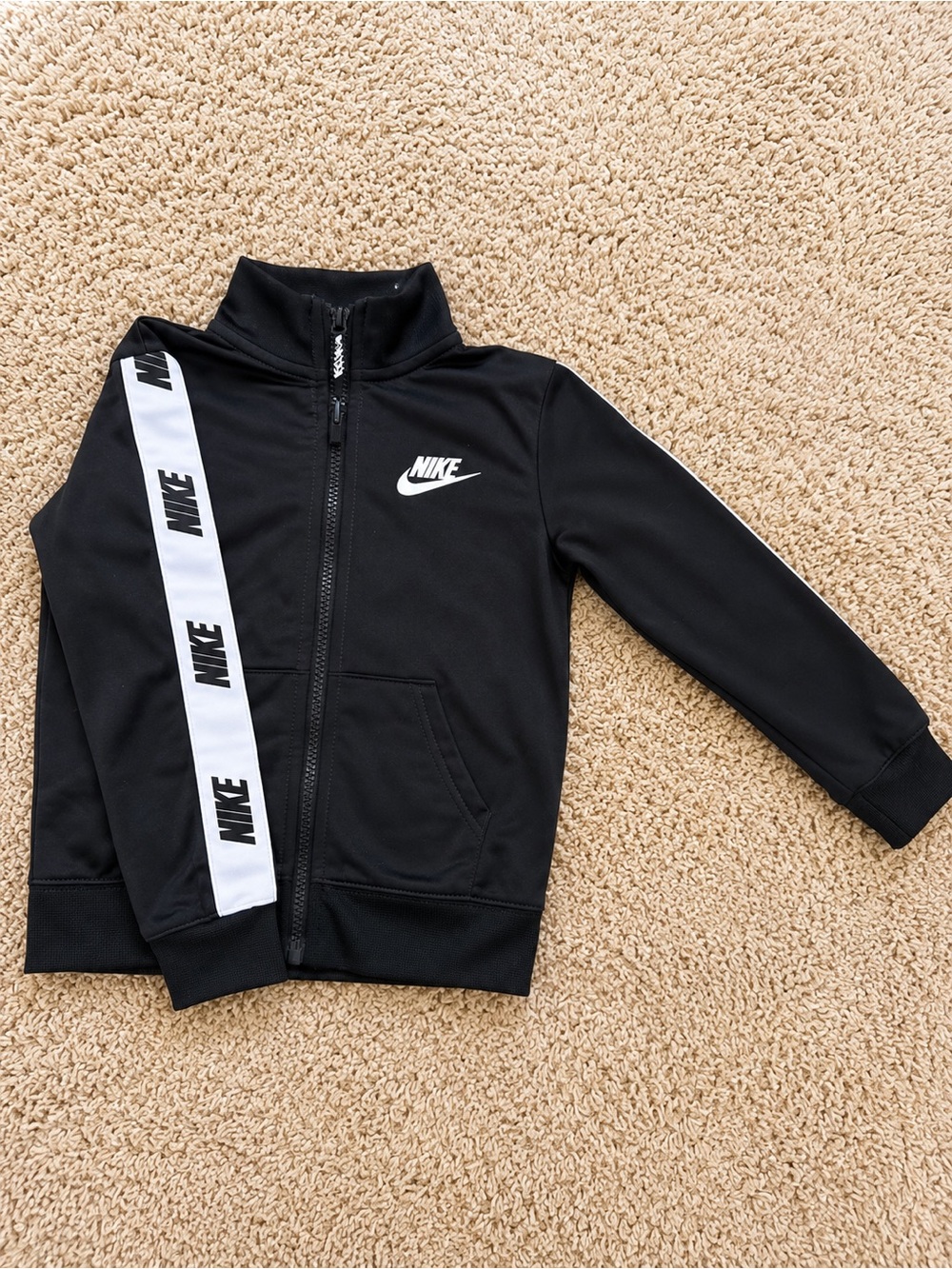 Nike Black Kids Zip-Up Track Jacket with White Logo Stripe